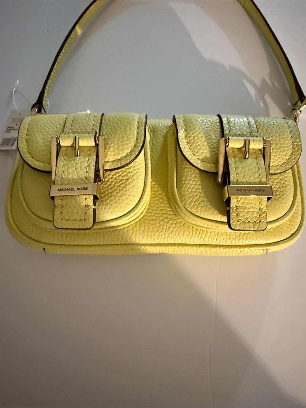 Michael Kors Zoe Lemon Pebbled Leather Shoulder Bag with Front Buckle Pocket.